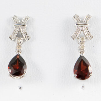 14 K White Gold Oval Garnet Earrings with Dias 1