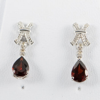14 K White Gold Oval Garnet Earrings with Dias 8