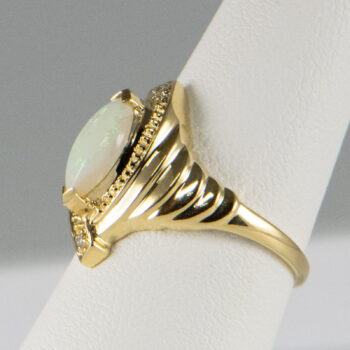 14 K Y Marquise Opal Ring with two Diamonds 16