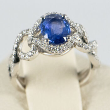 18 K White G Oval Tanzanite and Dias Ring 8 1