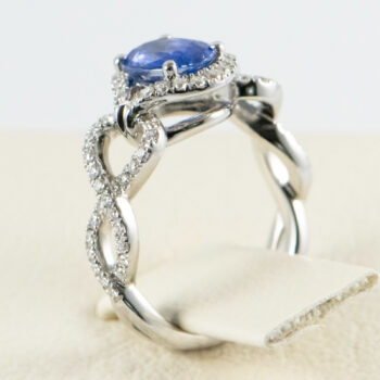 18 K White G Oval Tanzanite and Dias Ring 8 5