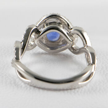 18 K White G Oval Tanzanite and Dias Ring 8 7