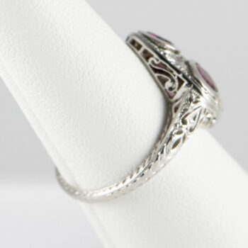 Platinum Ladies Ring with Rubies and Diamonds Pre owned 10