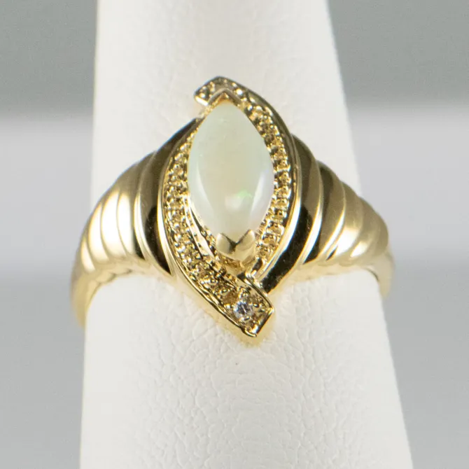 14 K Y Marquise Opal Ring with two Diamonds 14